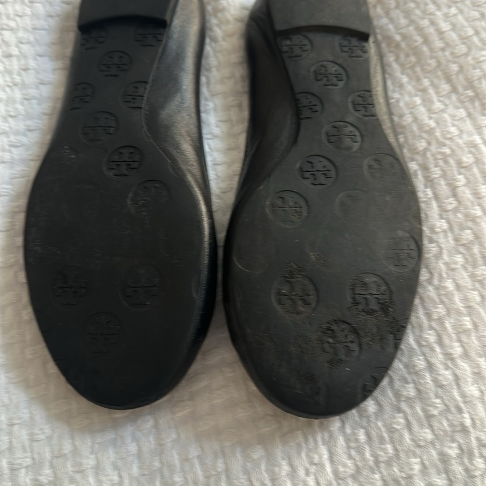 Tory Burch Black Flats with Gold Medallion - Picture 2 of 6